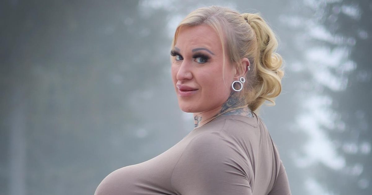Woman with 'biggest boobs in Finland' shows pole dancing skills in mini dress