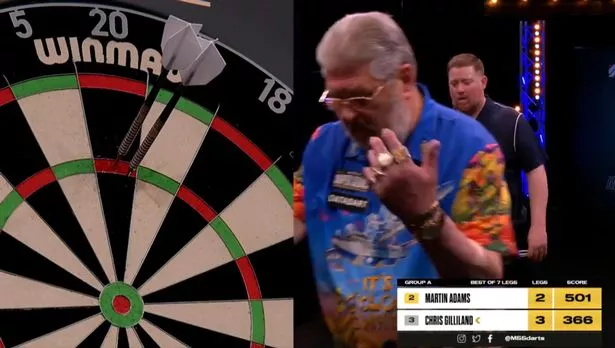 Ex-world champion darts player's throw is so bad it completely misses the board